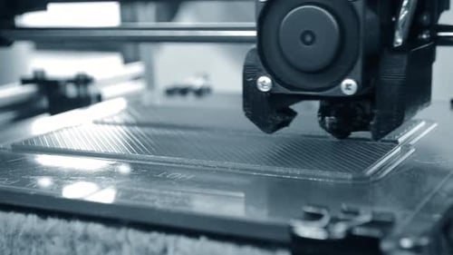 3D Printer Printing Prototype From Molten Plastic Process of Creating Model