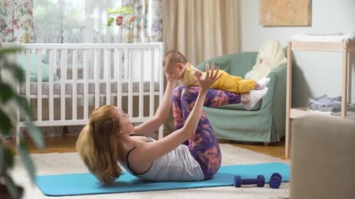 Woman Exercises with Infant in Bright Home
