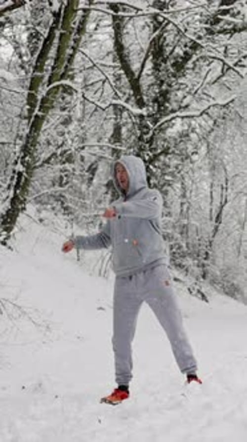 Person Engaging In Cold Weather Workout Man Prepares Physically Amidst Wintery Forest Conditions