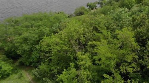 The Dnipro river aerial view drone flying over the ukrainian vilage