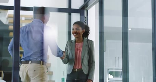 Welcome, talking and business people with a handshake for a meeting, interview or b2b