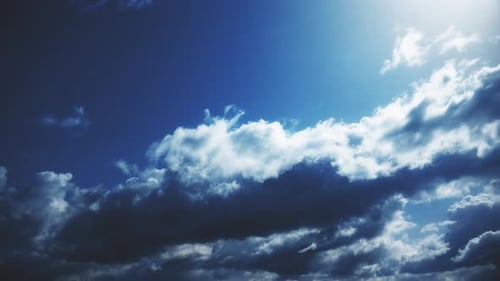Dramatic Time-Lapse of Cumulus Clouds in Blue Sky