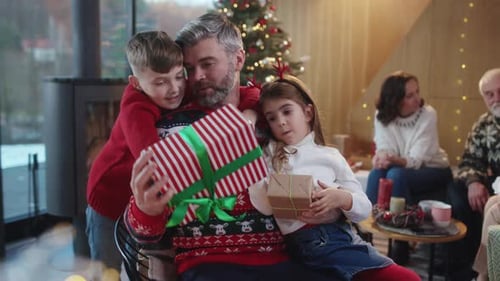 Family Celebrates Christmas Together at Home