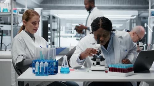 Scientists Working in a Medical Research Lab