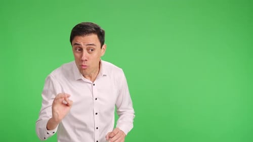 Businessman Giving Presentation on Green Screen Background