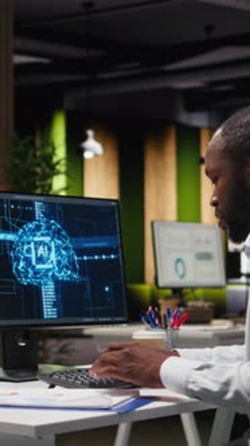 Vertical Video Office Employee Checking Monthly Data Reports with AI Analytics Platform