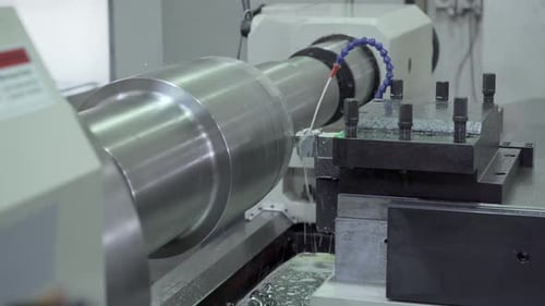 CNC Lathe used to carve out various heavy duty metal molds which are used to manufacture metal wire/