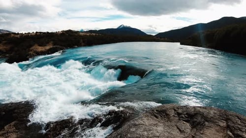 Rapid River Flows in the Mountains in Chile