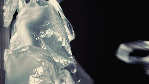 Vertical Waste Collection Plastic Packets Pile