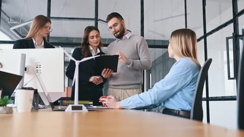 Active discussion. Business people are working in the office.