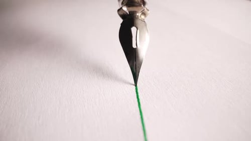 Classic Writing Instrument Fountain Pen Nib In Macro Green Ink Flow on Paper