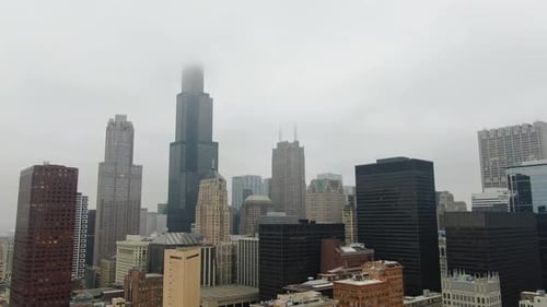 Static of Chicago Downtown Skyline Covered in Clouds and Fog