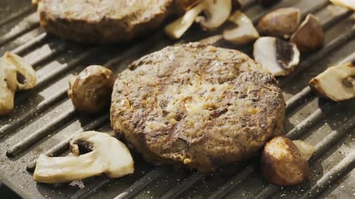 Vegetarian Burger Made From Mushrooms on a Grill Pan