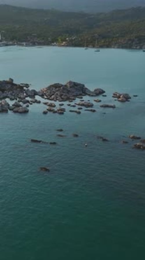 Vertical Video Stunning Aerial Footage of Ka With Azure Bays Floating Yachts and Picturesque Coastal