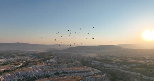 Aerial Cinematic Drone View of Colorful Hot Air Balloon Flying Over Cappadocia