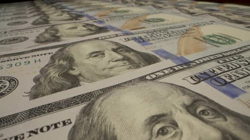 Close Up View Of Stacked One Hundred Dollar Bills