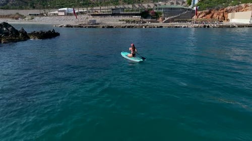 Aerial View Paddleboarding in the Open Sea Near Alanya on a Sunny Summer Day