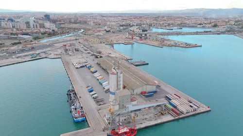 Ship Docked at Port Surrounded By Water Sky Urban Design and Dock with Cargo Ships