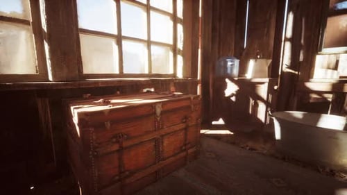 Rustic Cabin Interior With Sunlight Rays On Old Chest