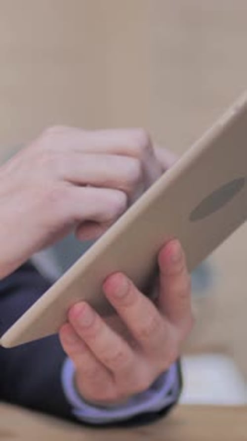 Close Up of Businessman Using Tablet, Vertical Video