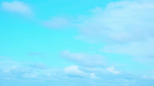 4K timelapse of beautiful blue sky with clouds background