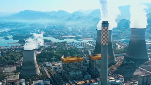 erial view of chimneys of power plant, an industrial district. Modern large thermal power plant