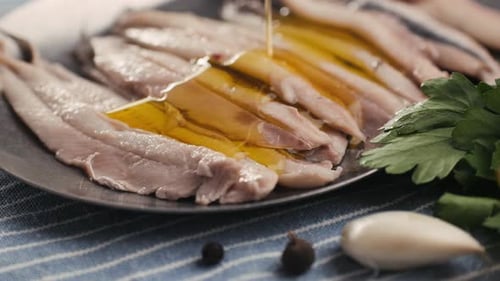 Fresh Sea Sardines and Anchovy Fish and Mullus On Display On Ice On Market Store Shop Seafood Fish