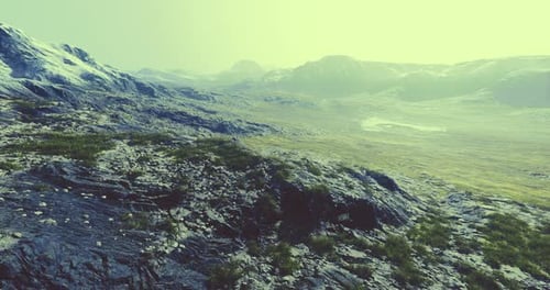 Majestic Mountain Landscape with Rocky Terrain and Green Patches in Daylight
