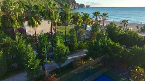 Aerial View Paddle Courts Host Dynamic Training Sessions and Matches with the Mediterranean