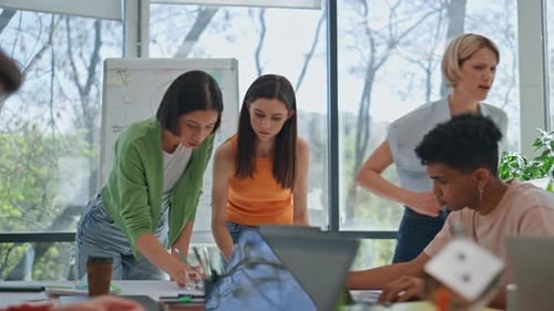 Busy Young Team Working in Workplace Together Creative Coworkers Sharing Ideas