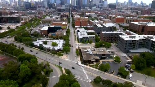 aerial drone footage of the Chicago downtown metropolitan area during a bright sunny day. the view o