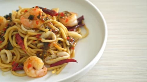 Delicious Pasta with Shrimp and Squid Close-Up