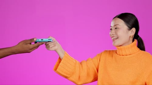 Cell Phone and Credit Card Exchange on Pink