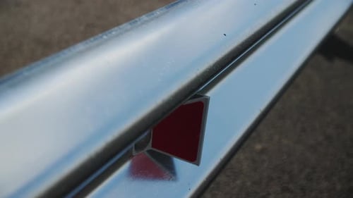 Metal Traffic Fence with Light Reflecting Element on Road