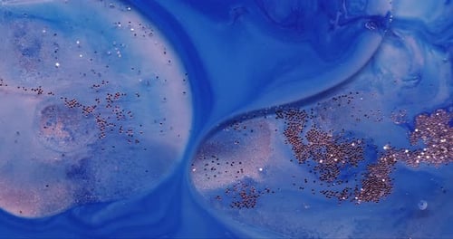 Abstract Blue and White Fluid with Glitter