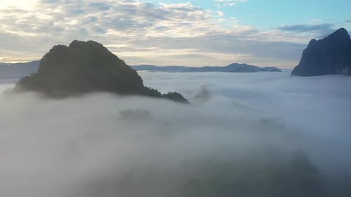 Aerial View Of Tropical Mountain And Rain Forest Landscape In The Morning Mist