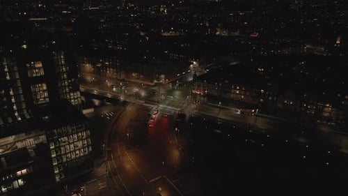 Aerial View of Illuminated City Streets at Night