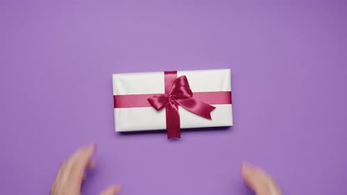 Beauty of Giving and Receiving Gifts Presents Between Man Woman Violet Top View Couple Celebrations