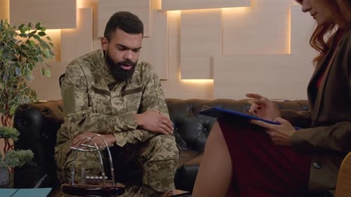 Soldier Talking with Therapist at Office, Healthcare