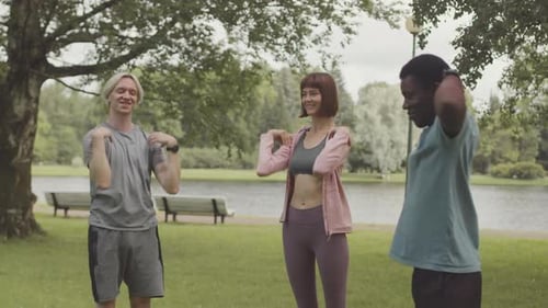 Multiethnic Young People Training Outdoors Together