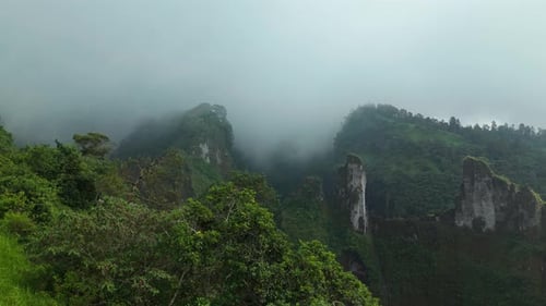 Aerial view of mountains covered with fog, Indonesia.