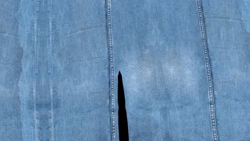 Denim Fabric Tearing Transition Reveal
