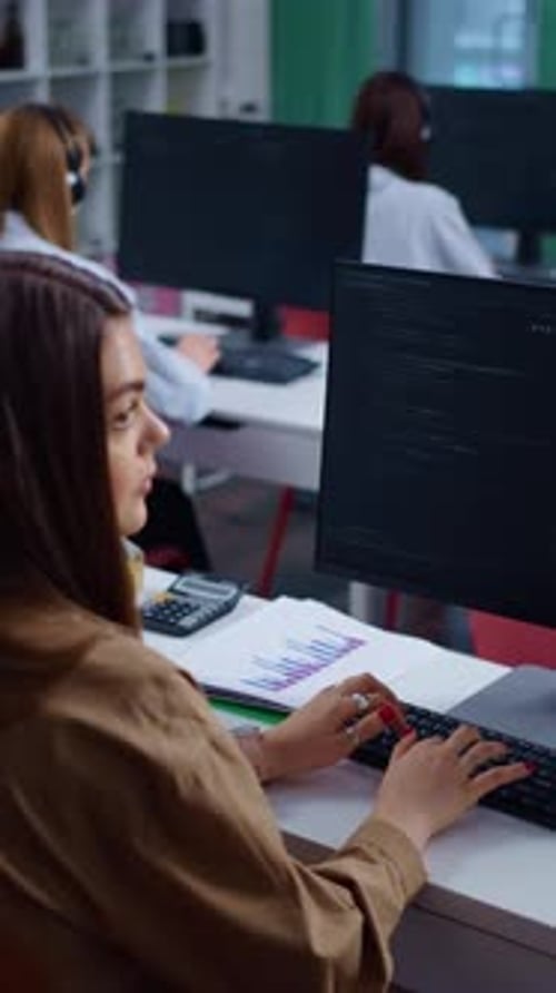 Women working at computers in a modern office