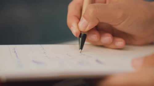 Closeup Hand Signing Legal Document Professional Pen Strokes on Contract Office Setting Seal and