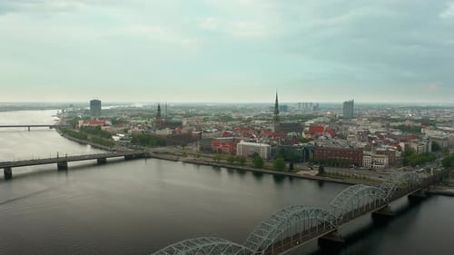 Aerial video of Riga city center, panning cityscape with bridges. 4k footage.