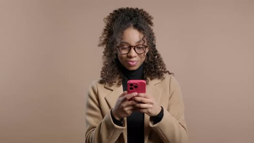 Woman Using Phone, Smiling