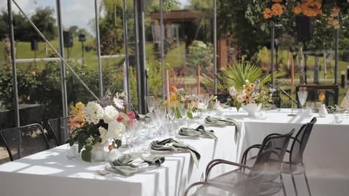 Elegant Wedding Reception Table Setup in Glass House