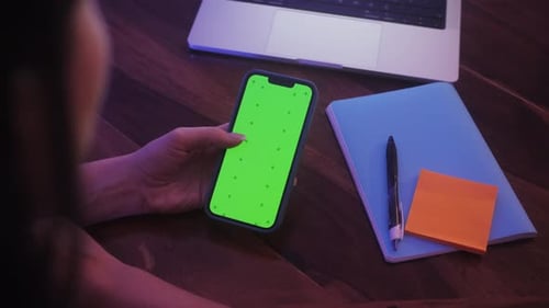 Phone with Green Screen and Chroma Key for Copy Space Lifestyle and Leisure Concept Swipe Left and