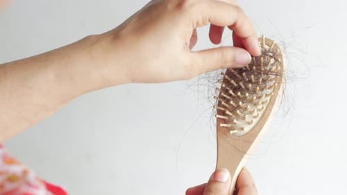 Rear View of Women Hold His List Hair Close Up