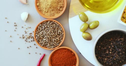 Vibrant Herbs and Spices in Round Bowls